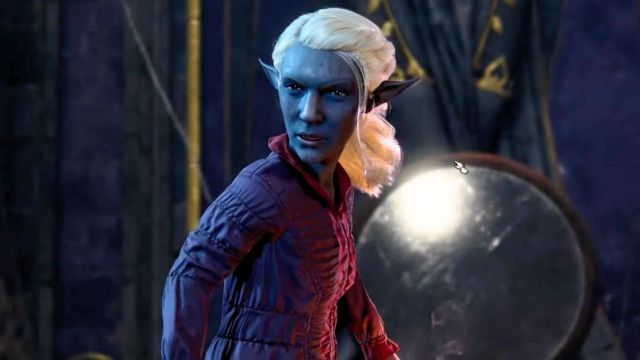 Blue elf woman with yellow hair and red armor in Grymforge in BG3