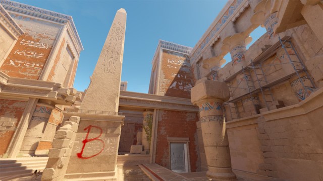 An obelisk with hieroglyphs painted with the letter B sits in the middle of the B bombsite on Anubis in Egypt in Counter-Strike 2.
