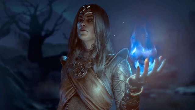A sorcerer holding a blue flame in Diablo 4.