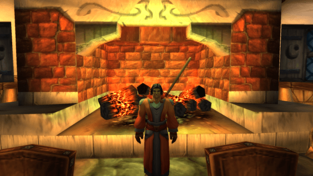 Image of a mage standing in front of a fireplace.