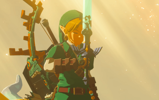 Link holding the Master Sword up to his face in Tears of the Kingdom.
